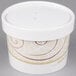 A white Solo paper soup container with a symphony swirl design.