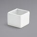 A white square Front of the House porcelain ramekin.