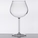 A close-up of a clear Tritan plastic wine glass with a clear stem.