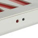 A close up of a Lavex Slim red and white LED exit sign and emergency light.