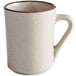 An Acopa white stoneware coffee mug with a brown speckled rim.