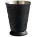 A matte black metal cup with beaded detailing and a silver rim.