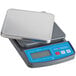 A grey AvaWeigh digital portion scale with a silver lid and tray.