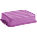 A purple rectangular Vollrath Color-Mate bus tub with a lid.