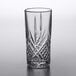 An Arcoroc clear beverage glass with a diamond design.