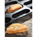 A loaf of bread in a Sasa Demarle oblong shape silicone bread mold.