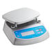 An Avaweigh IP68 waterproof digital portion scale on a counter.
