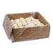 A white box filled with plastic wrapped circles of Rich's sugar cookie dough.