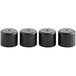 A row of four black rubber cylindrical feet with a hole in the end.