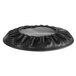 A black round cushion with a ruffle on top.