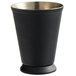 An Acopa matte black mint julep cup with silver beaded detailing on the rim.