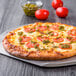 A pizza with tomatoes and cheese on a Rich's Fresh N Ready pizza crust.