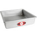 A rectangular silver pan with a red label.