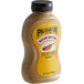 A Pilsudski plastic squeeze bottle of mustard with a yellow label.