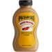 A yellow plastic Pilsudski Bacon Jalapeno Mustard squeeze bottle with a yellow label.