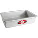 A silver rectangular Fat Daddio's cake pan with a red and white label.