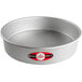 A round silver Fat Daddio's cake pan with a red and white label.