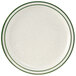 A white Tuxton china plate with a green speckled narrow rim.