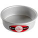 A round silver Fat Daddio's cake pan with a red label.