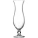 A clear plastic Arcoroc hurricane glass with a curved rim and stem.