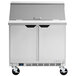 A stainless steel Beverage-Air refrigerated sandwich prep table with two doors.