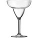 An Arcoroc clear plastic margarita glass with a stem and a rim.