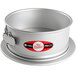 A round silver metal Fat Daddio's Springform Cake Pan with a round base.