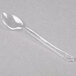 A clear plastic WNA Comet Petites tasting spoon.
