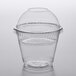 A Fabri-Kal Greenware clear plastic parfait cup with a clear dome lid and insert inside.