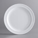 A close-up of an Acopa Foundations white melamine plate with a narrow white rim.