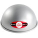A silver hemisphere cake pan with a red and white label.