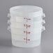A stack of three Cambro translucent round plastic food storage containers with lids.