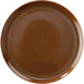 A brown plate with a white surface and brown rim.