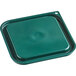 A green square Vigor food storage container lid with a hole in the middle.