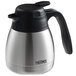A silver stainless steel Thermos coffee carafe with a black lid.