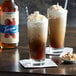 Two glasses of iced coffee with Torani Puremade Zero Sugar Hazelnut syrup.