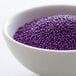A bowl of purple nonpareils.