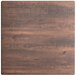 A Lancaster Table & Seating square table top with a textured walnut finish.