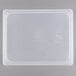 A translucent plastic lid on a plastic container.