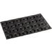 A black baking tray with 24 rectangular holes.