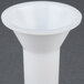 A white plastic sausage stuffer tube for a #12 meat grinder.