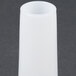 A white cylindrical sausage stuffer tube.