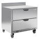 A Beverage-Air stainless steel worktop freezer with two drawers on wheels.