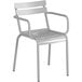 A silver powder coated aluminum outdoor arm chair with armrests.