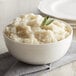 A bowl of mashed potatoes made with Instant Potato Flakes.