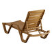 A brown plastic Lancaster Table & Seating chaise lounge chair with arms.