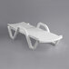 A white plastic chaise lounge chair with two handles.