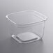 A clear Fabri-Kal square plastic deli container with a square lid.