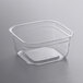 A clear Fabri-Kal square deli container with a clear lid.