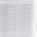 A translucent plastic San Jamar ModPan food container with measurements on it.